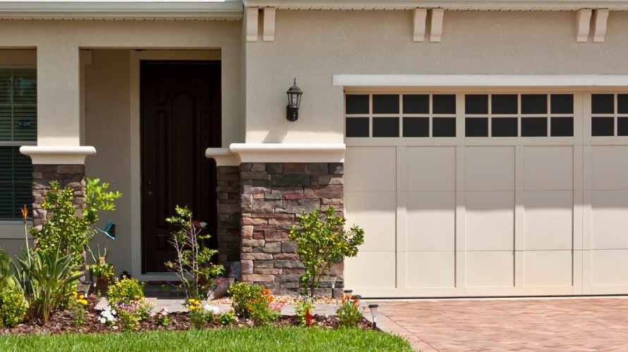 Custom vinyl mailbox decal with house numbers applied to a white mailbox