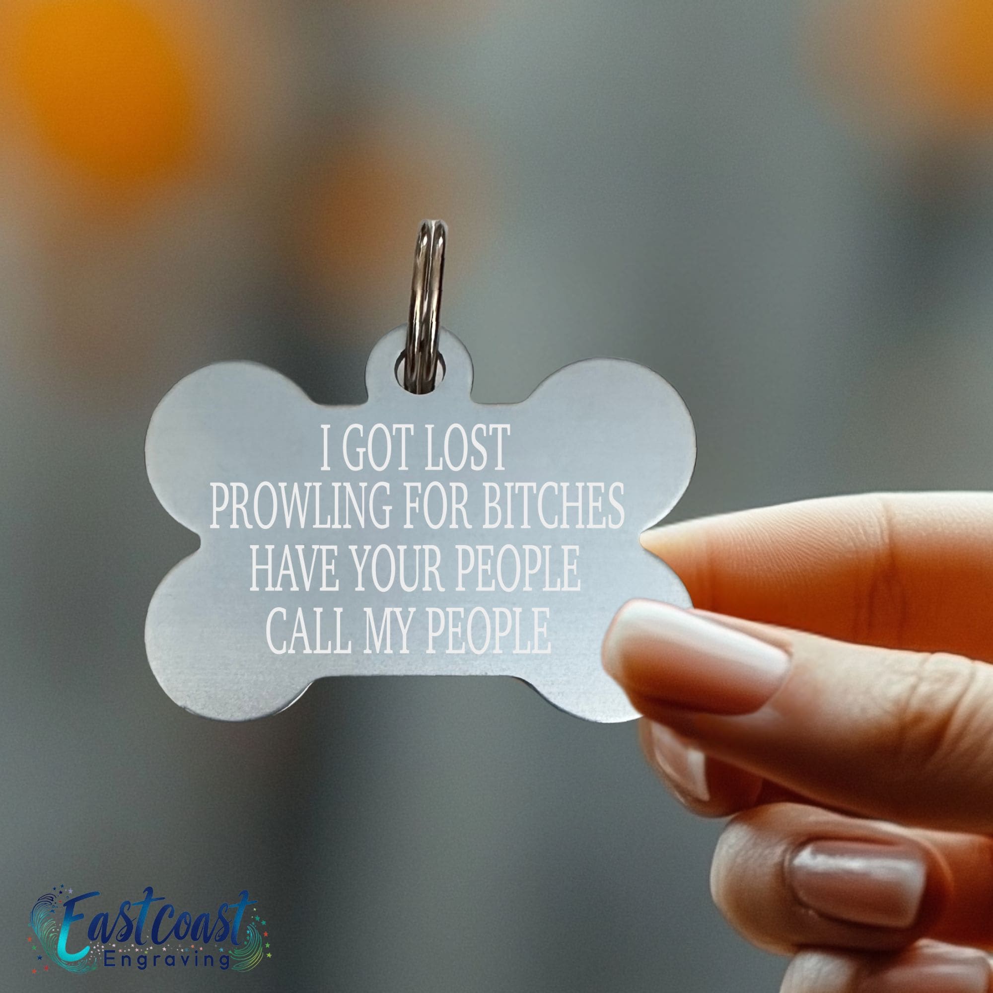 Funny engraved pet ID tag with "Prowling for Bitches" design