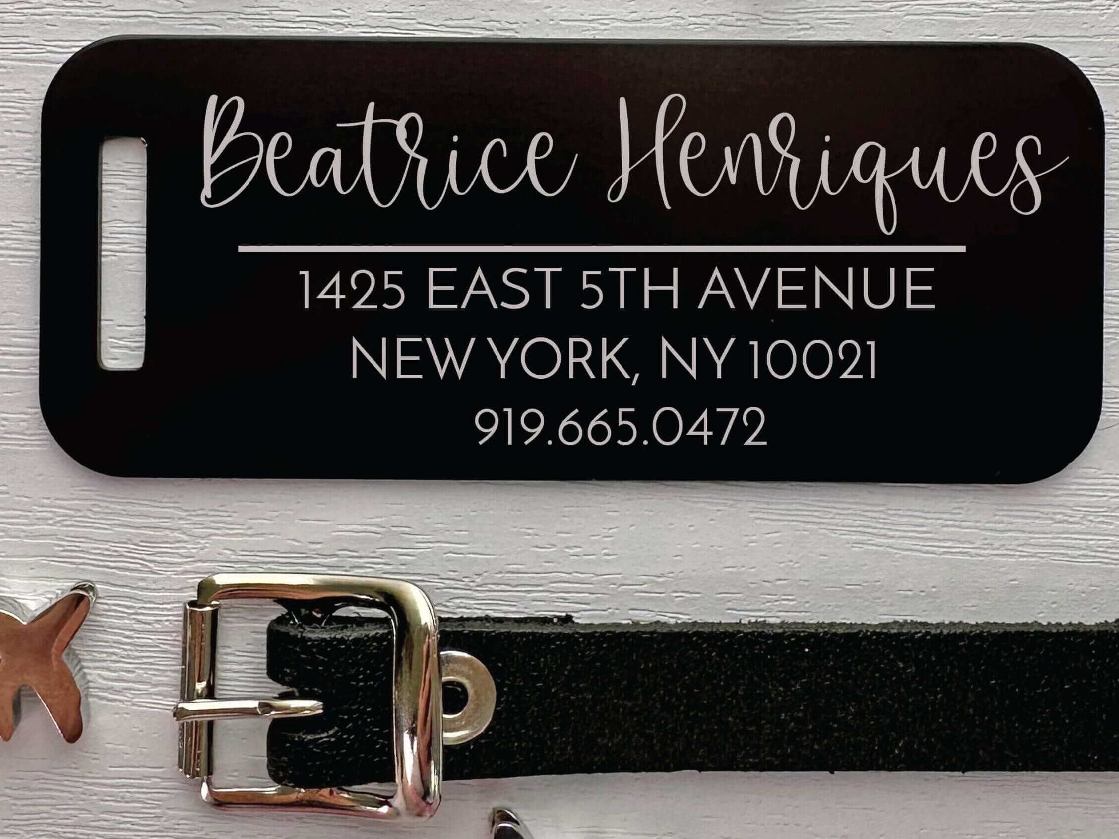 Laser engraved black aluminum luggage tag with custom name and address