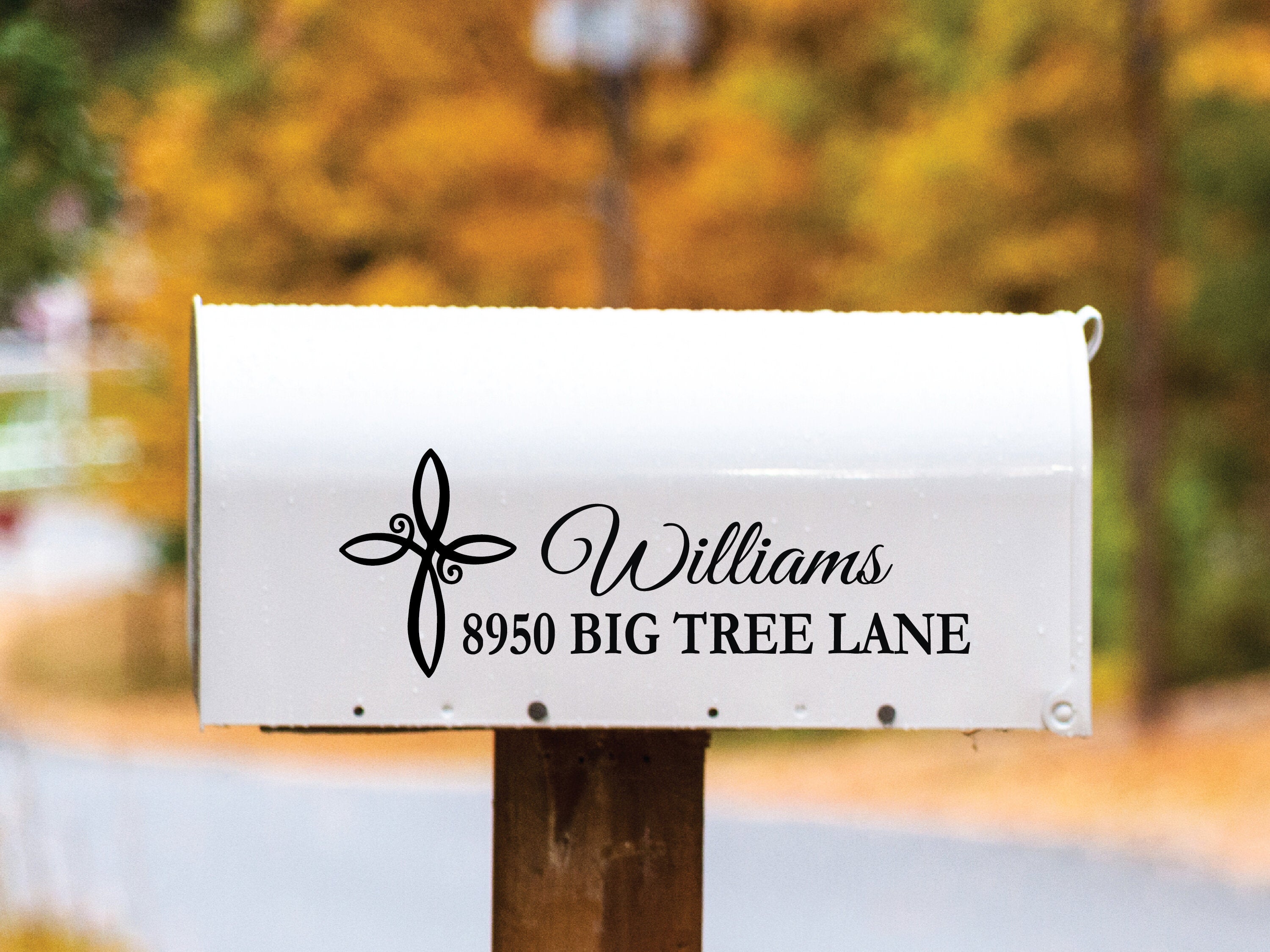 Personalized mailbox decal with floral cross and modern script font.