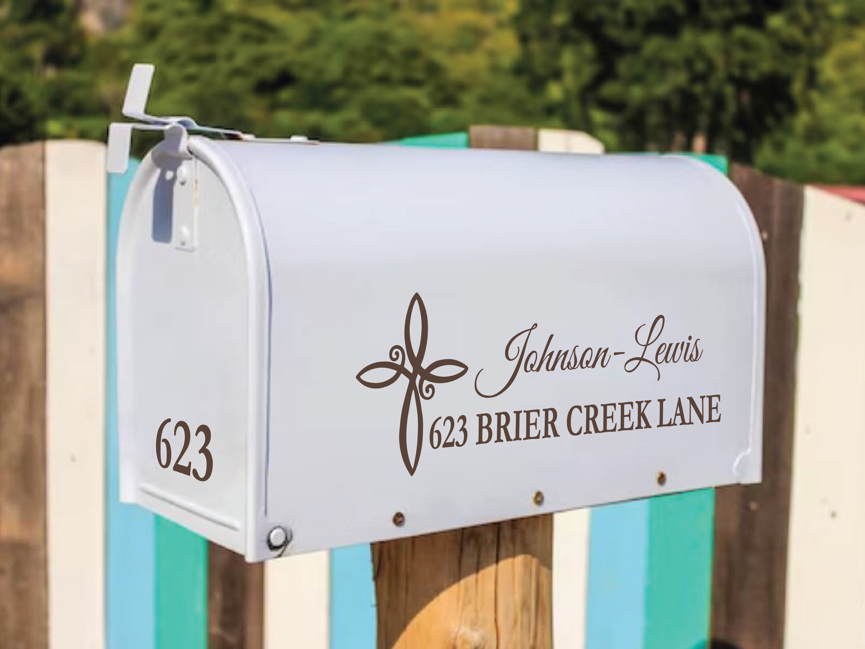 Custom vinyl mailbox decal with cross accent and street address on white mailbox.