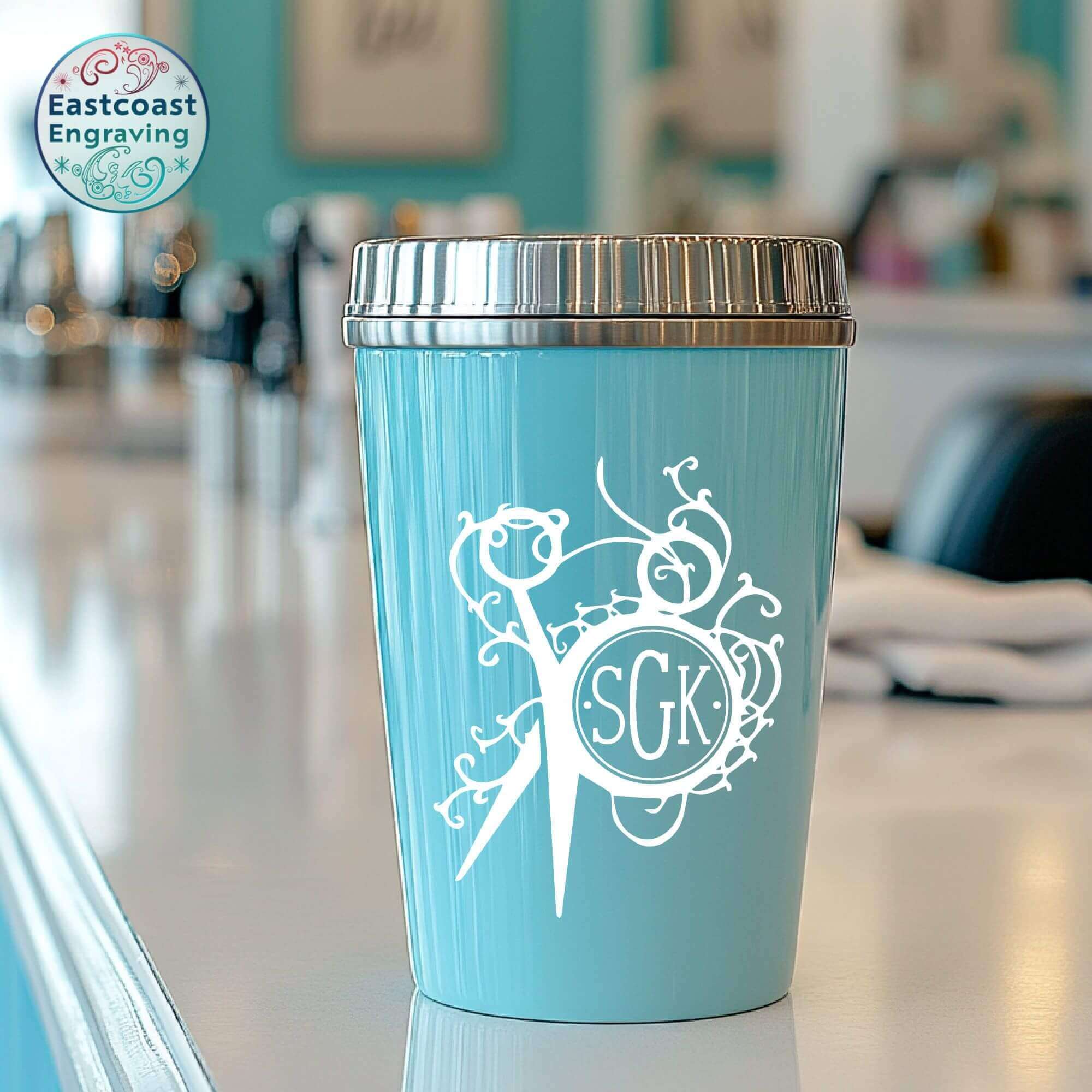 Custom monogram sticker featuring scissors design on a cup, great for stylists