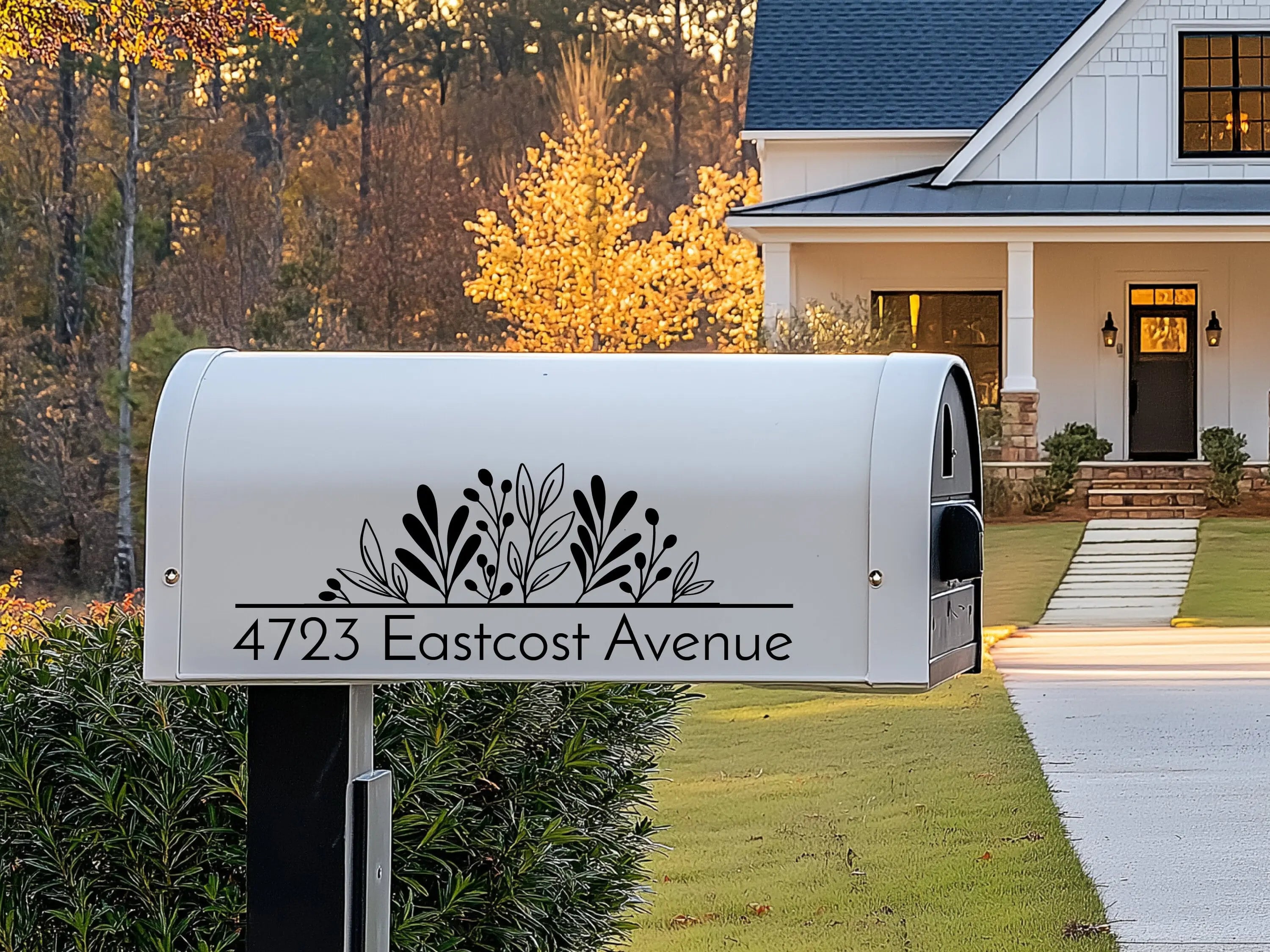Custom mailbox address in black on a white mailbox