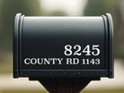 Vinyl house number and address decals applied to black mailbox