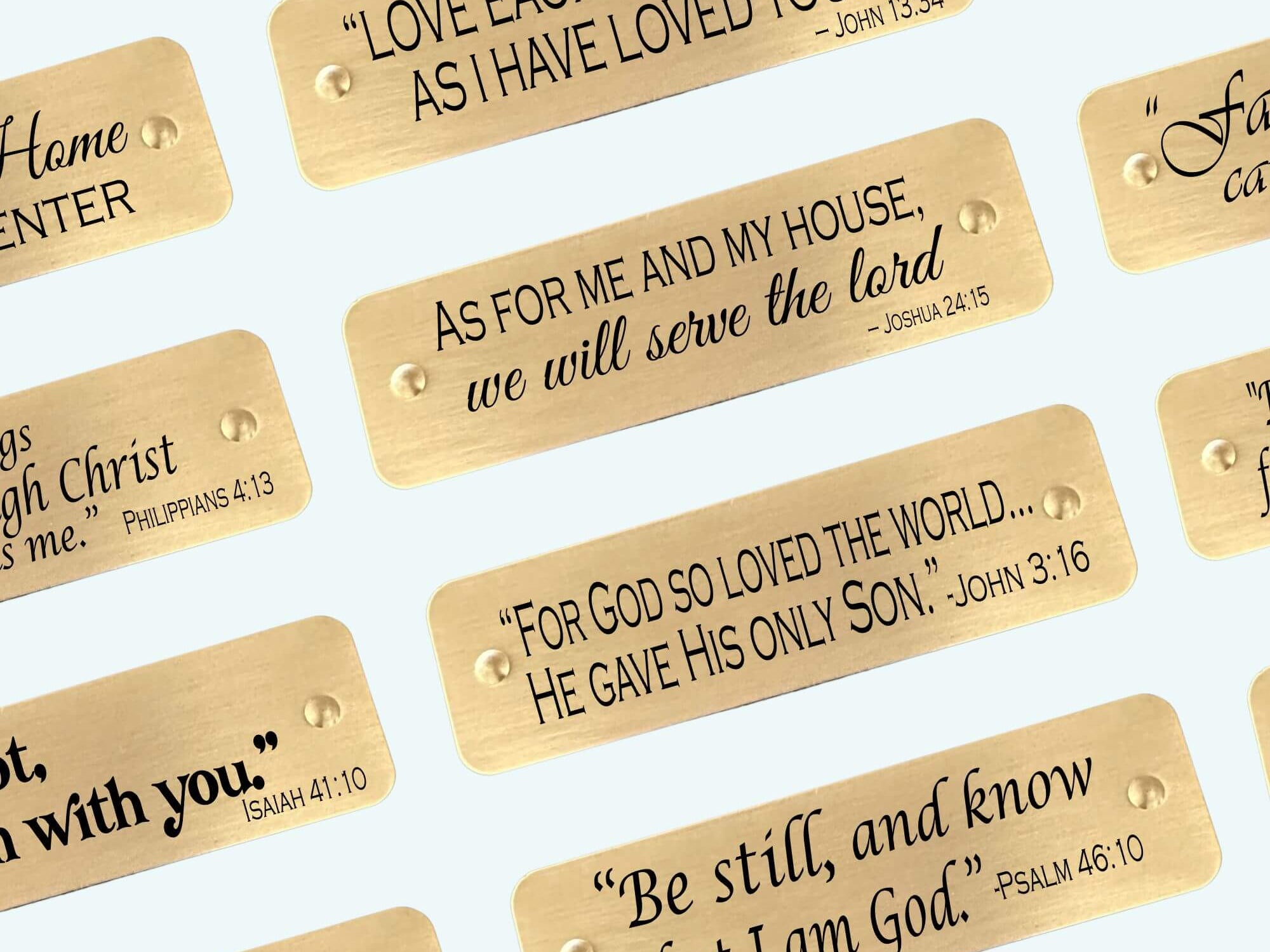 Multiple engraved Bible verse tags with inspirational scripture designs in brass, perfect for Christian gifts
