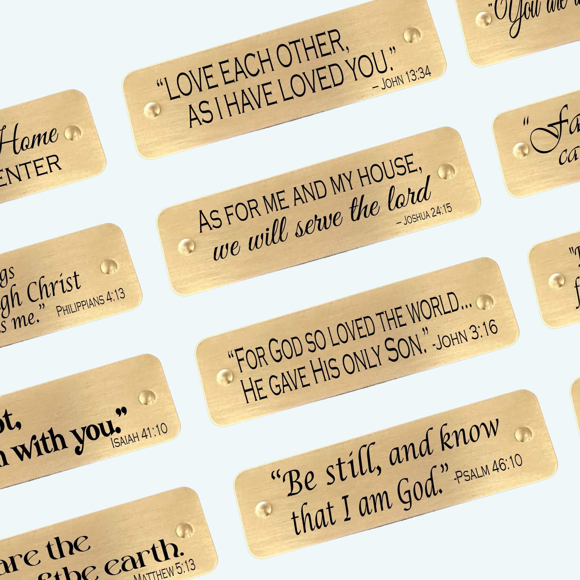 Multiple engraved Bible verse tags with inspirational scripture designs in brass, perfect for Christian gifts