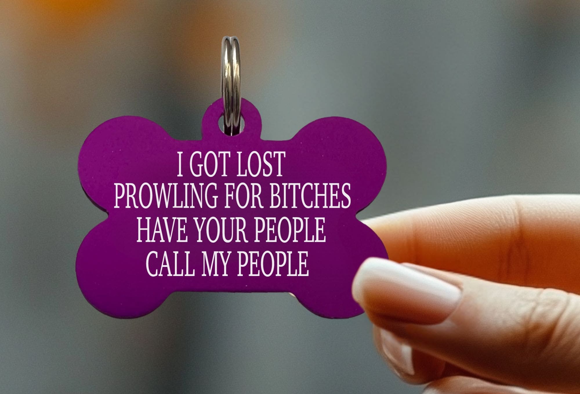 Durable engraved pet tag with playful "Prowling for Bitches" text