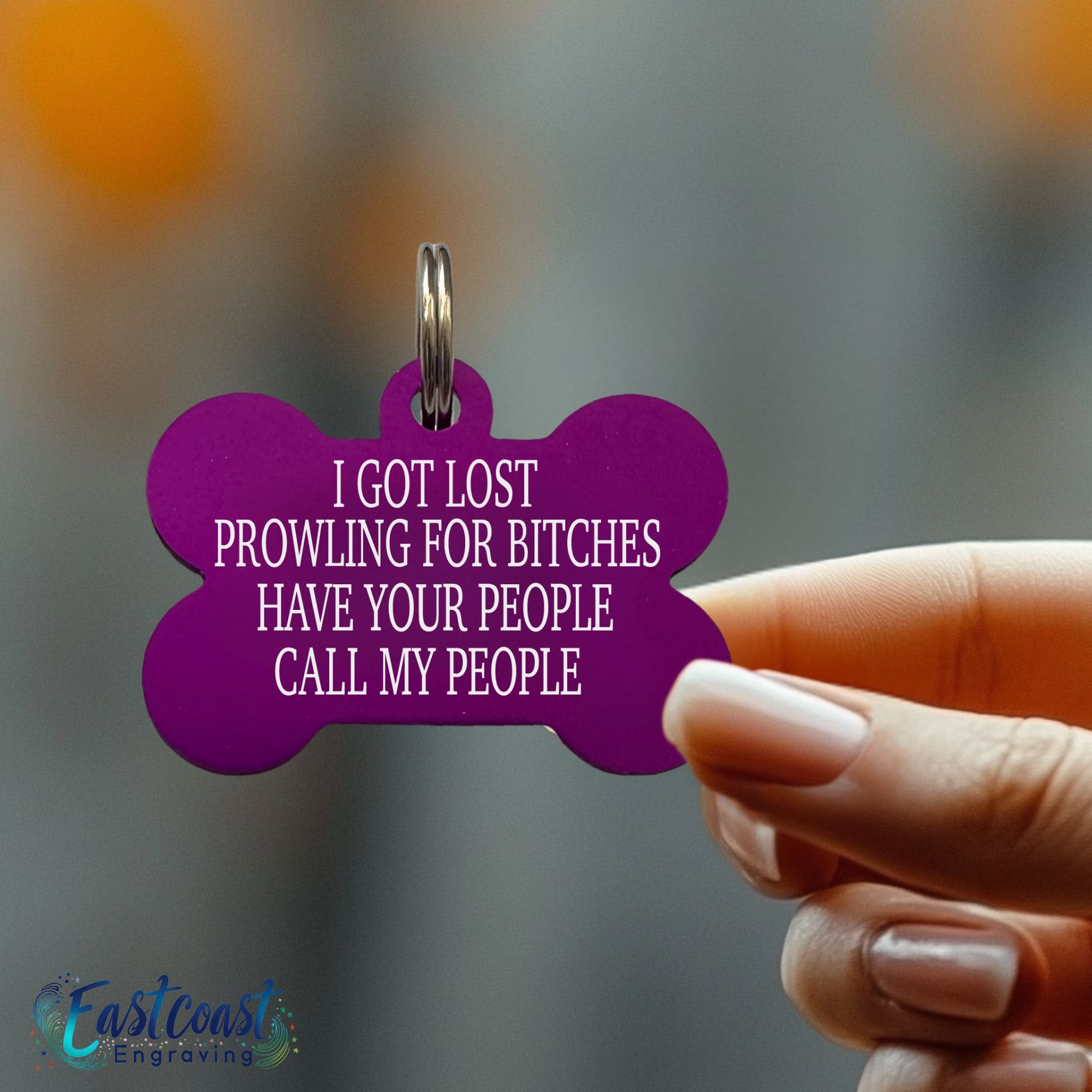 Durable engraved pet tag with playful "Prowling for Bitches" text