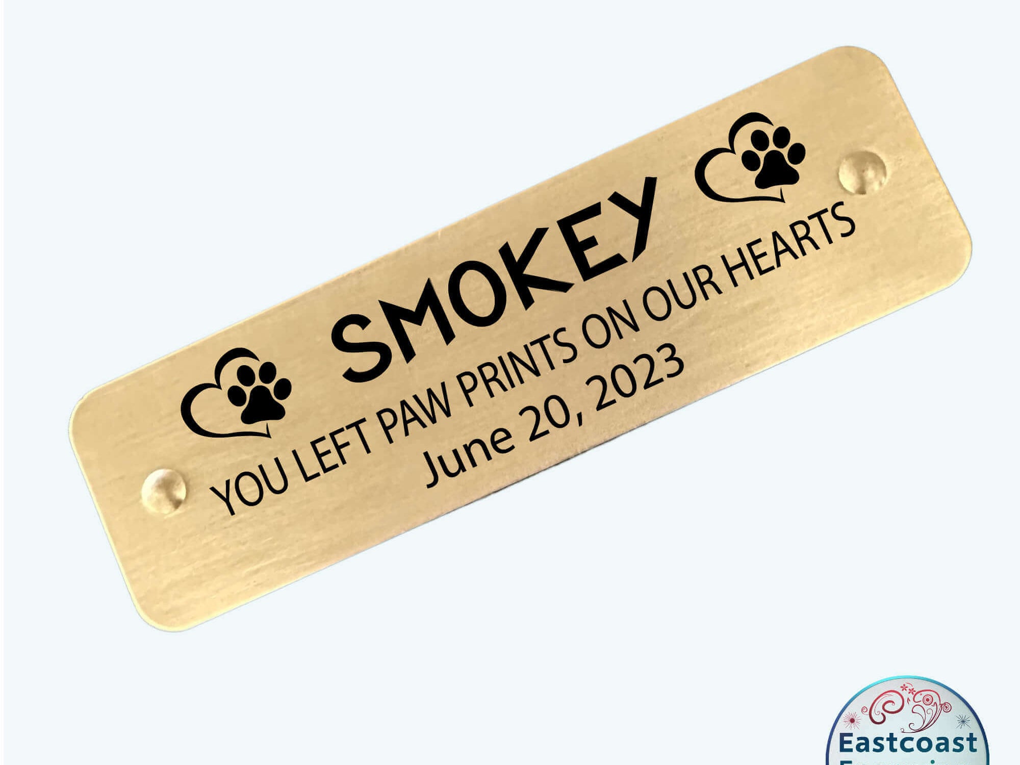 Brass pet memorial nameplate with custom engraving, suitable for remembrance displays.