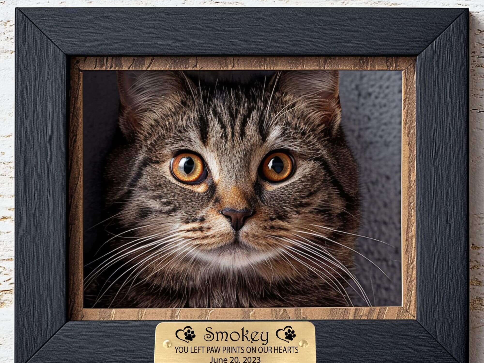 Engraved pet memorial tag in brass with adhesive backing, featuring custom name and date by Eastcoast Engraving.