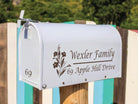 Floral mailbox decal on white mailbox with family name and address