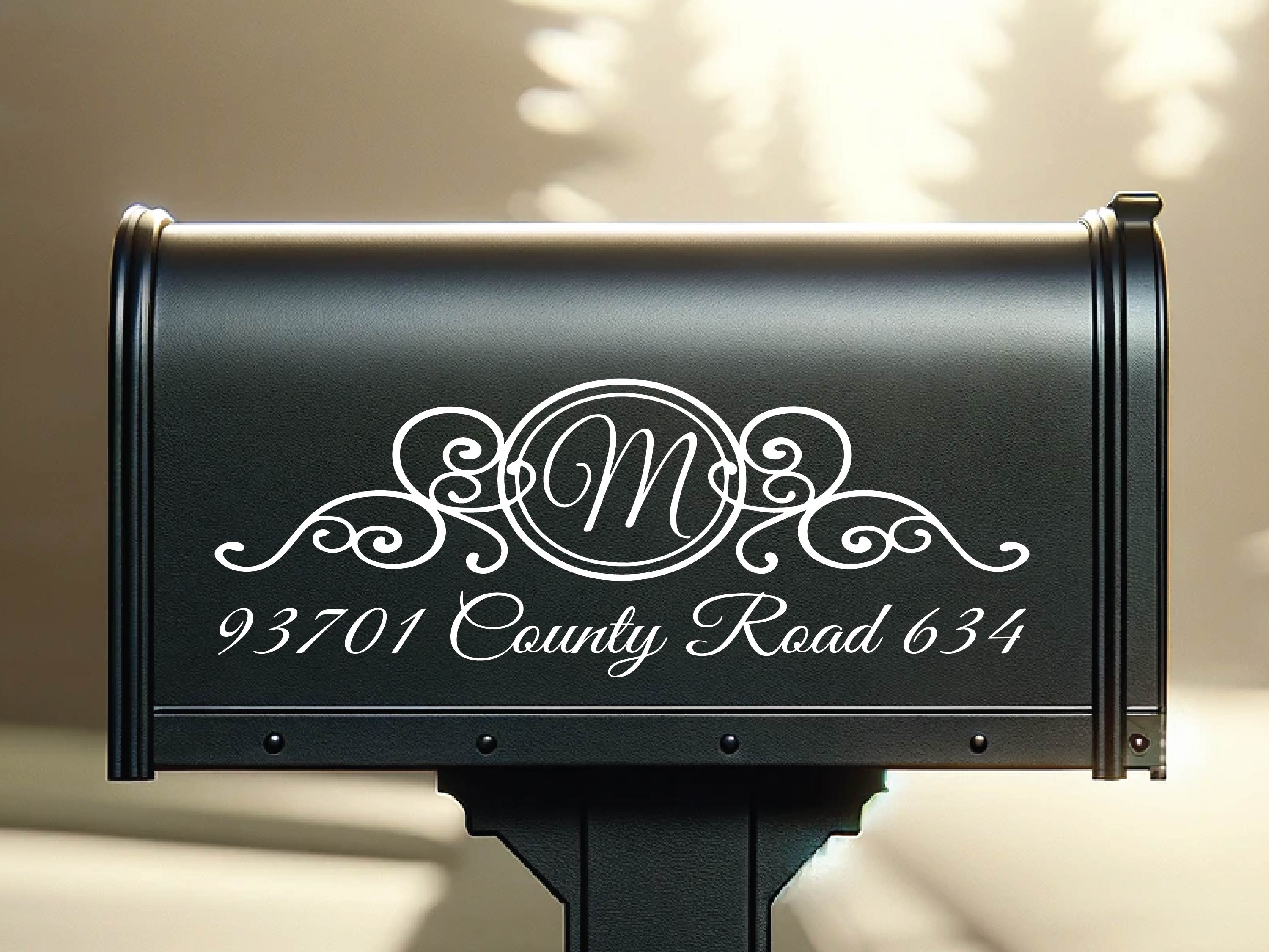 Full-size vinyl mailbox decal with initial, street name, and number in a scroll layout