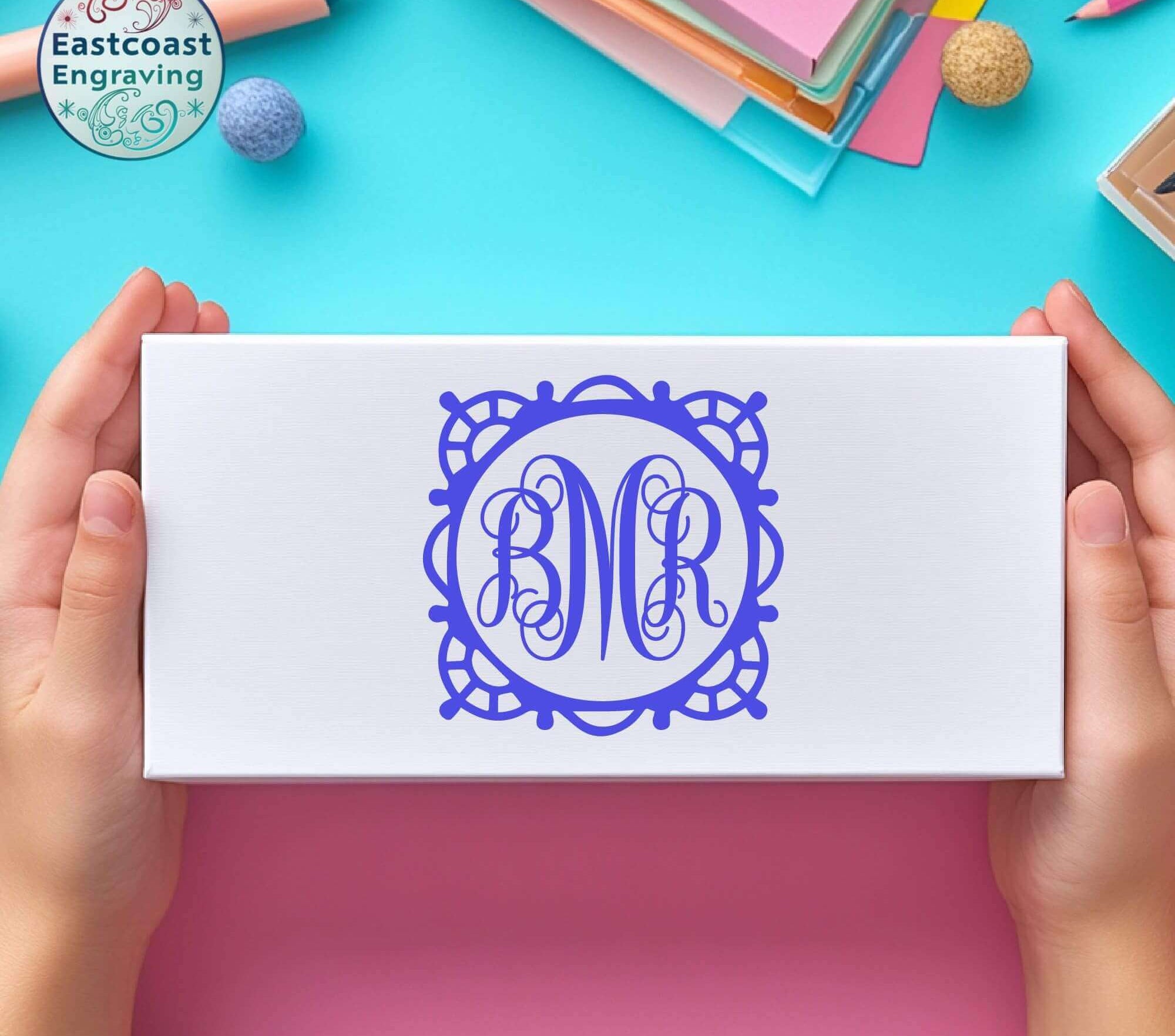 Initials vinyl decal on a gift box – stylish custom name sticker