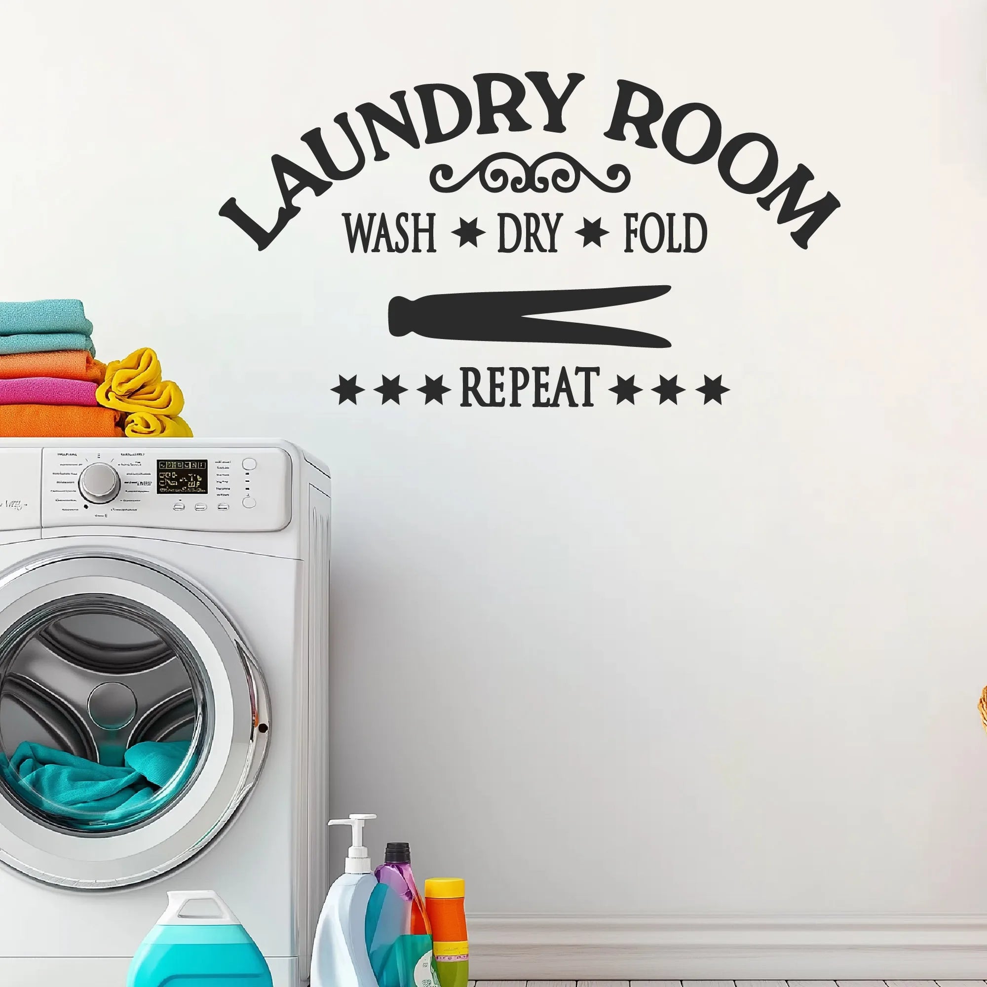 Bold vinyl laundry decal above washer and dryer for modern home decor
