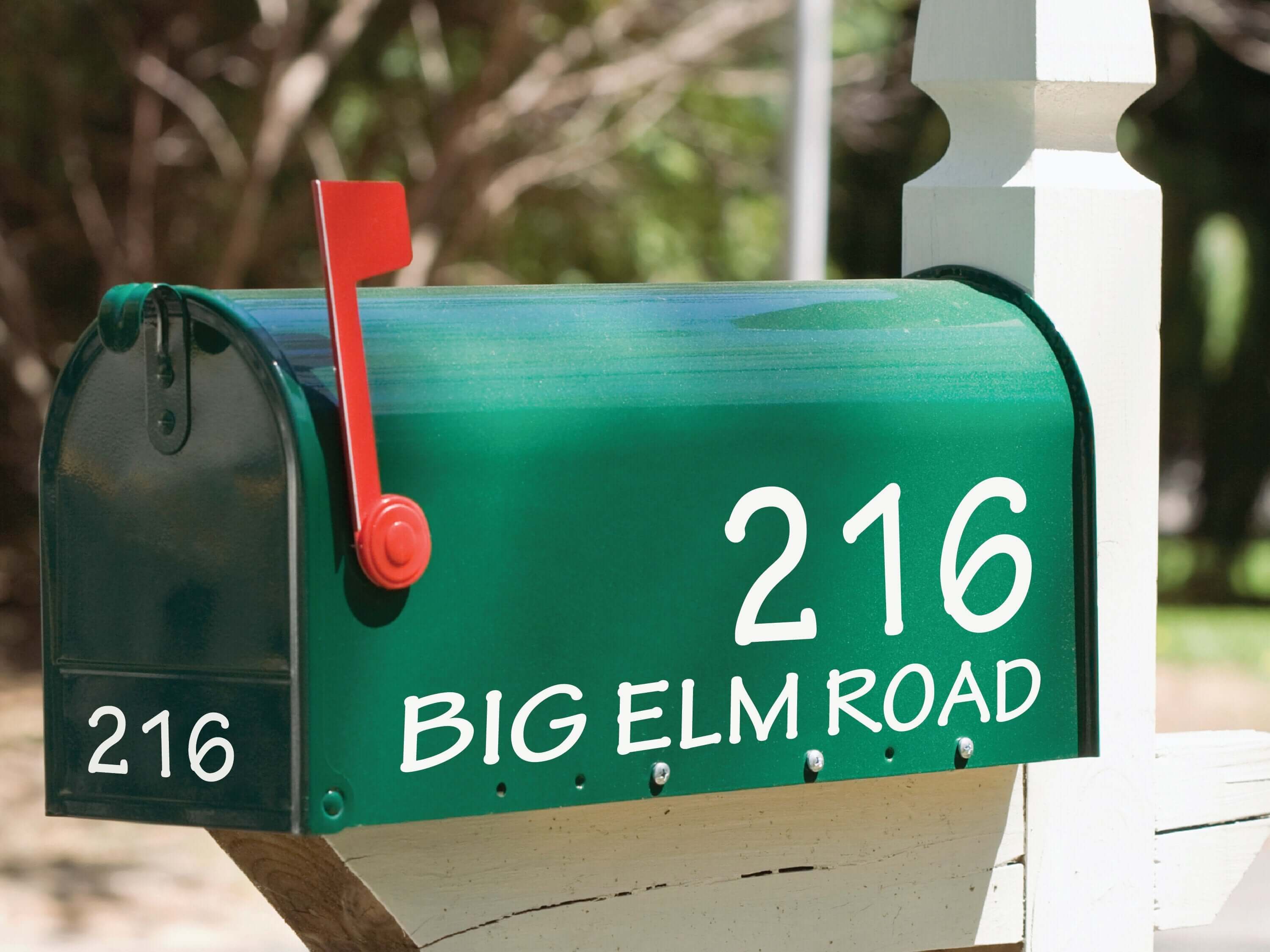 Two-piece mailbox decal kit shown on modern black mailbox