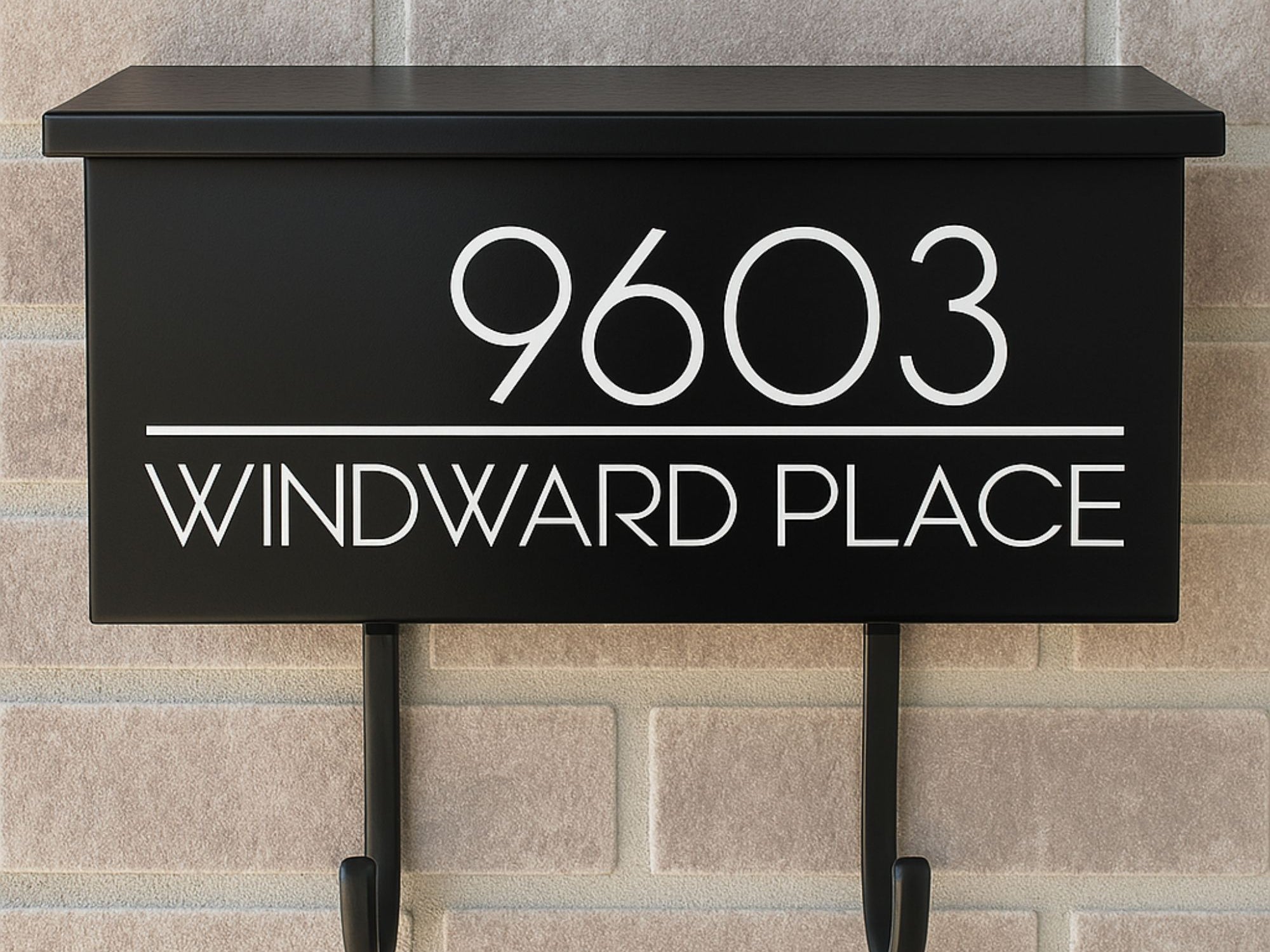 Custom wall-mounted mailbox decal with mid-century number and address design in modern white vinyl
