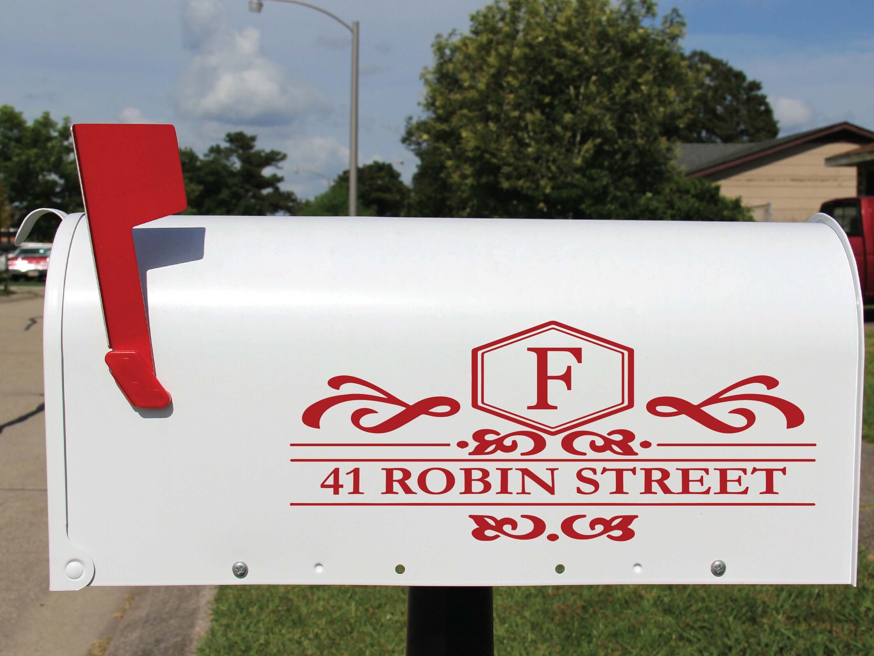 Personalized mailbox decal featuring scrollwork frame, house number, and initial monogram