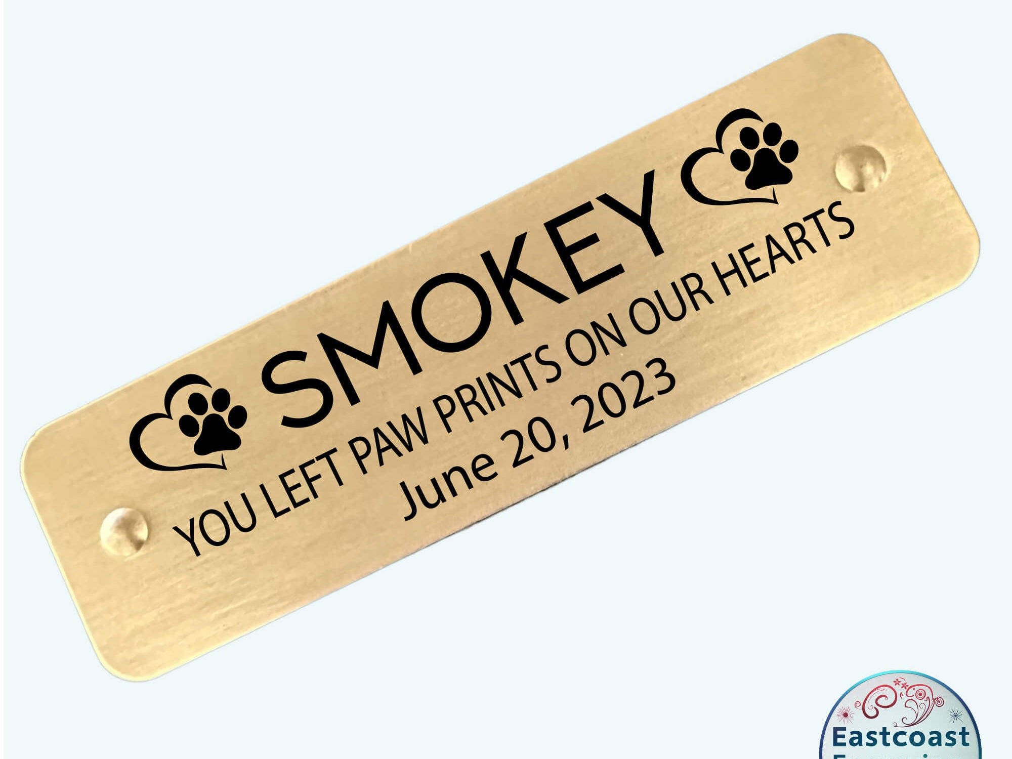 Elegant engraved pet memorial name tag in brass, perfect for honoring a beloved pet.