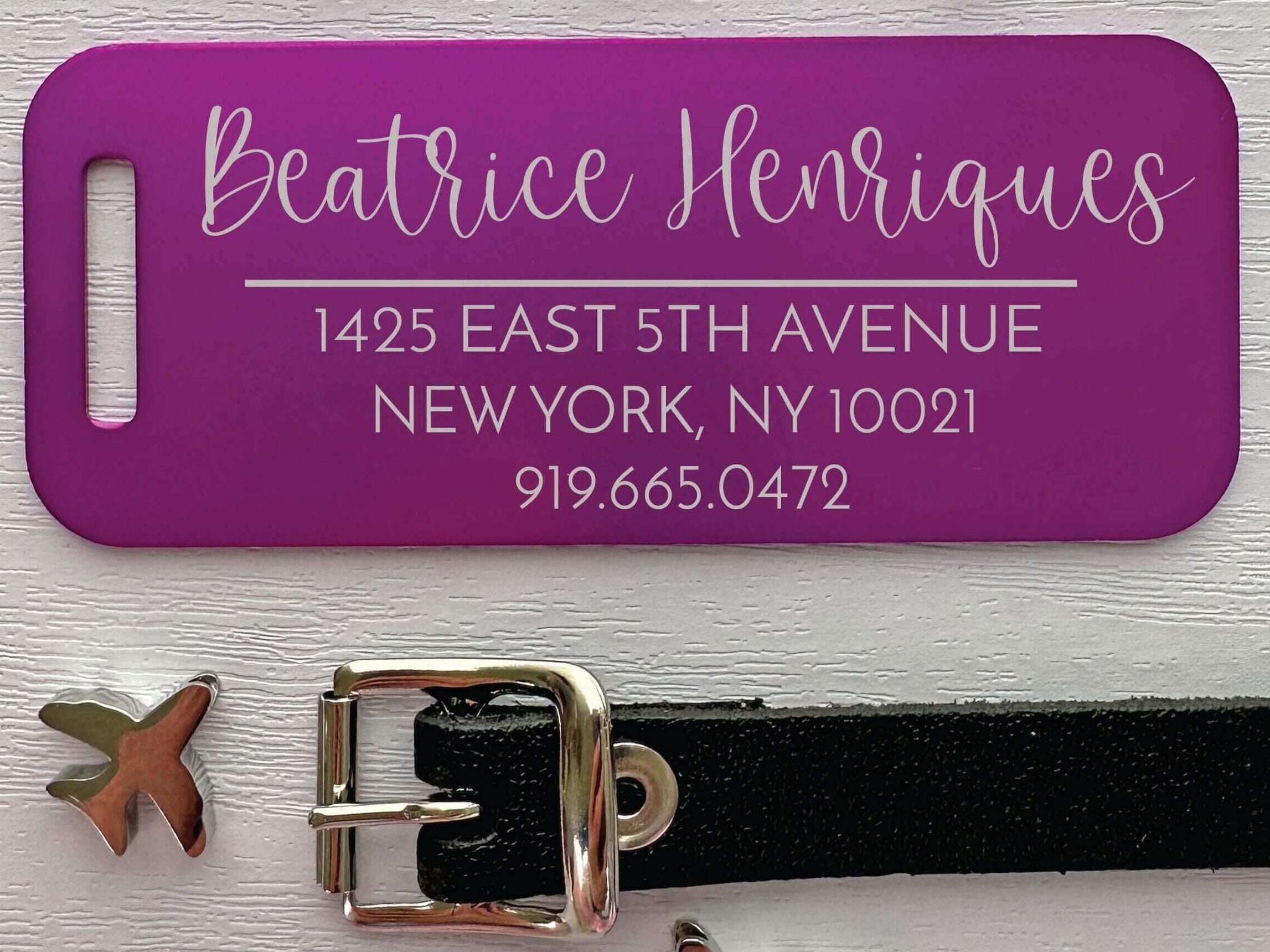 Personalized purple aluminum tag with engraved contact details