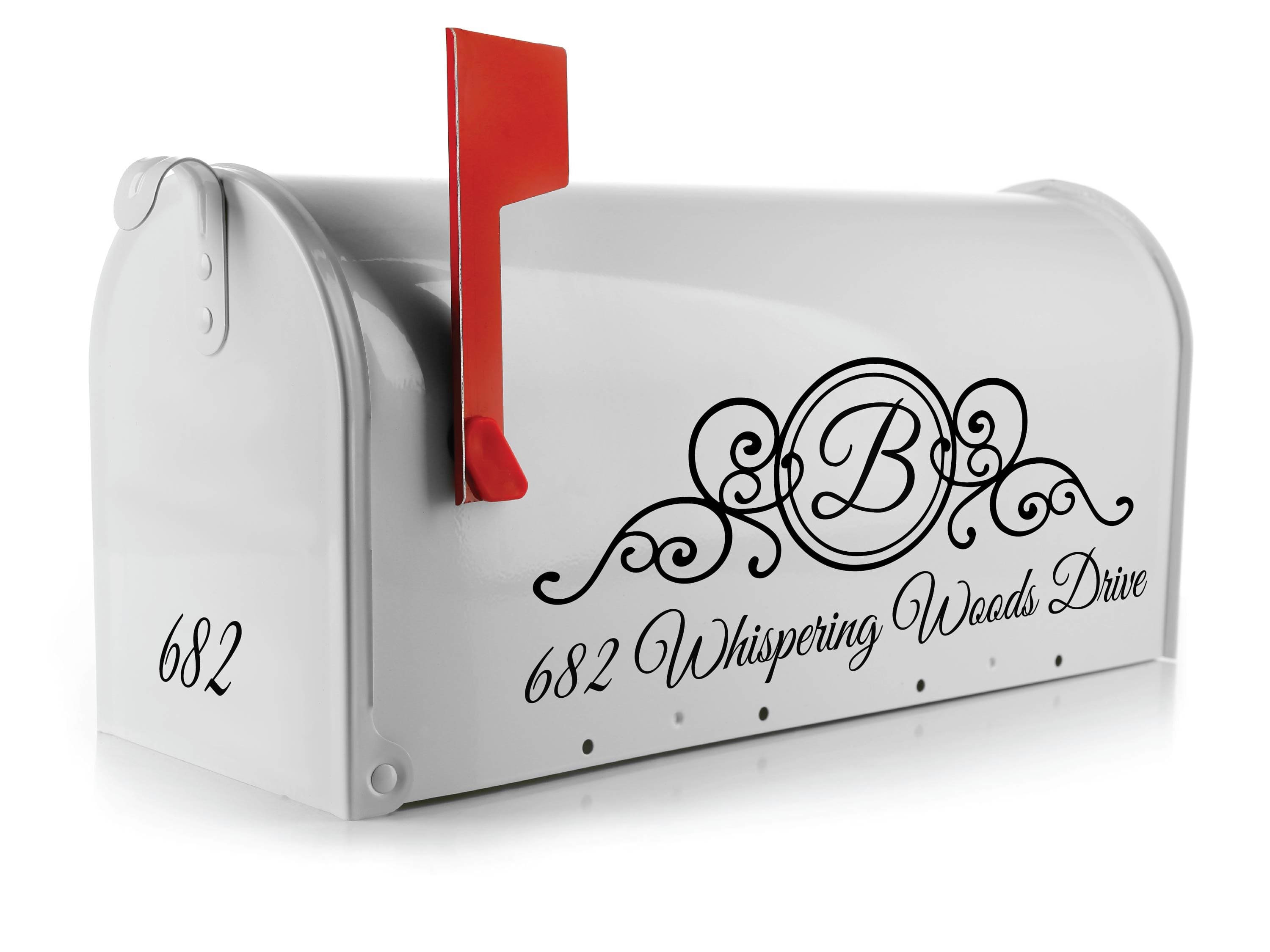 Scroll-style monogram mailbox decal on white mailbox with address and initial