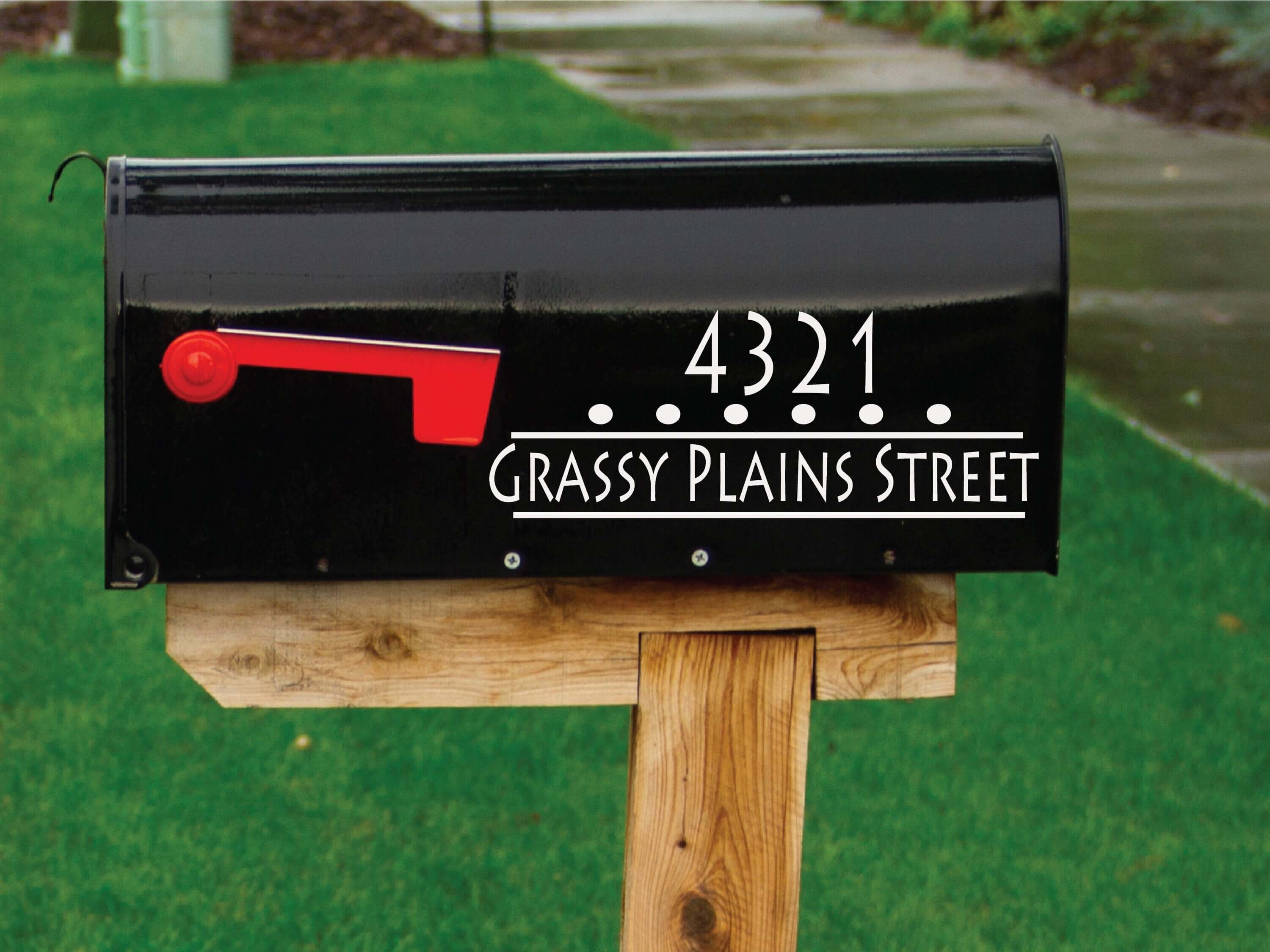 Close-up of custom street number and address decal on a black mailbox - Eastcoast Engraving