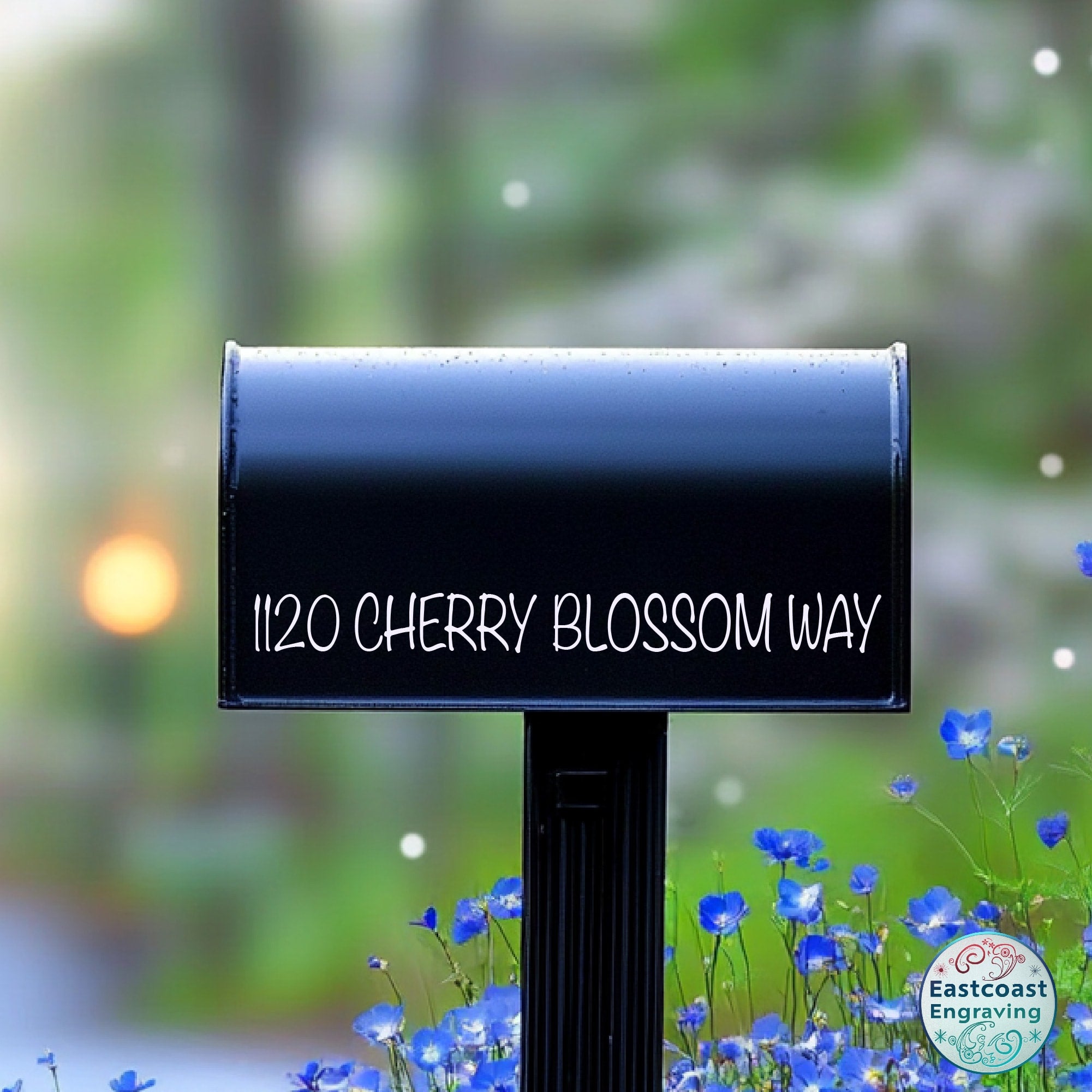 Minimalist single-line mailbox number sticker in clean vinyl lettering