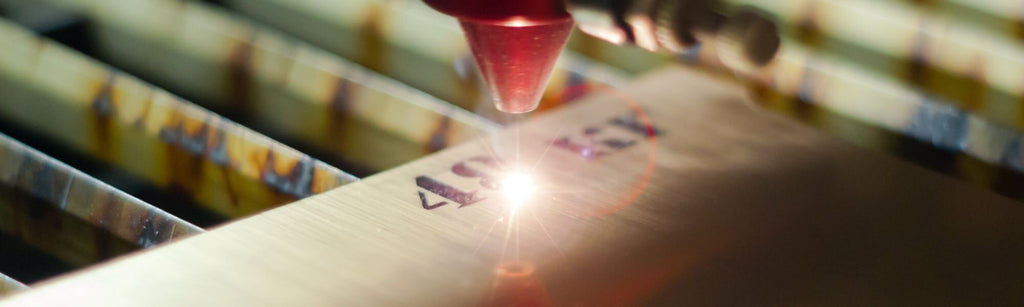Laser engraving machine engraving the numbers 458