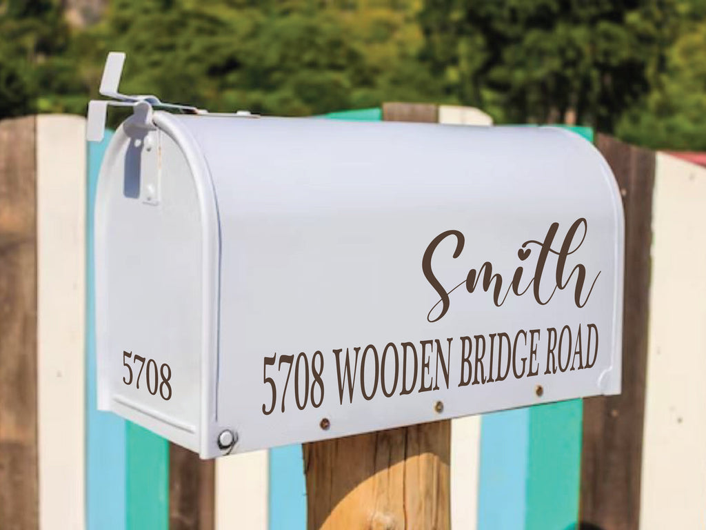 Custom-designed mailbox address sticker enhancing exterior home decor.