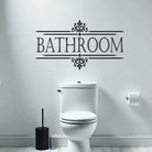 Modern bathroom vinyl wall decal on wall above toilet