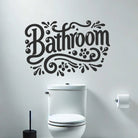 Bathroom vinyl wall sticker with bold lettering installed above toilet