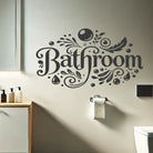Bathroom vinyl wall decal with bubble accents installed above sink and vanity