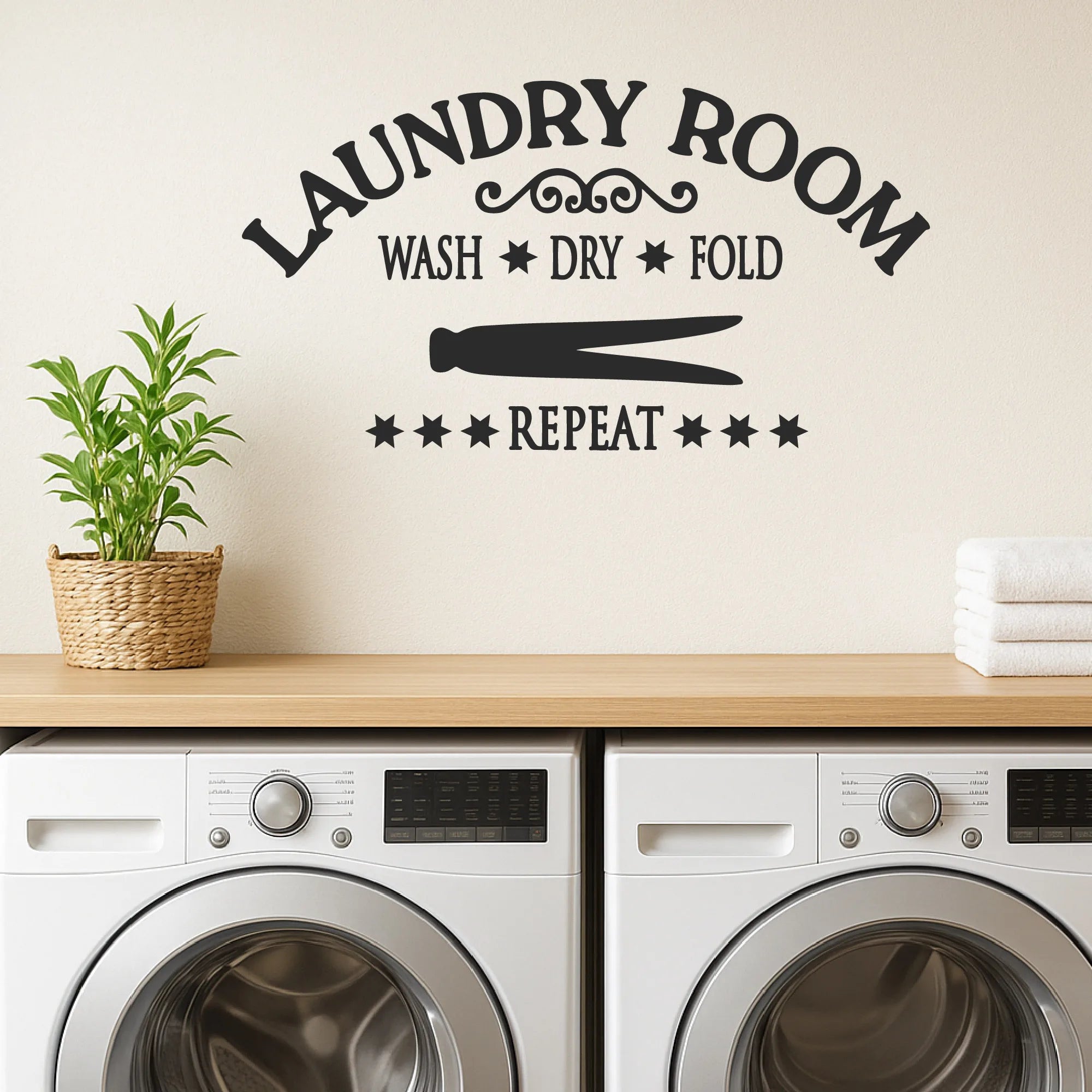 Laundry room wall decal with Wash Dry Fold Repeat text and clothespin graphic