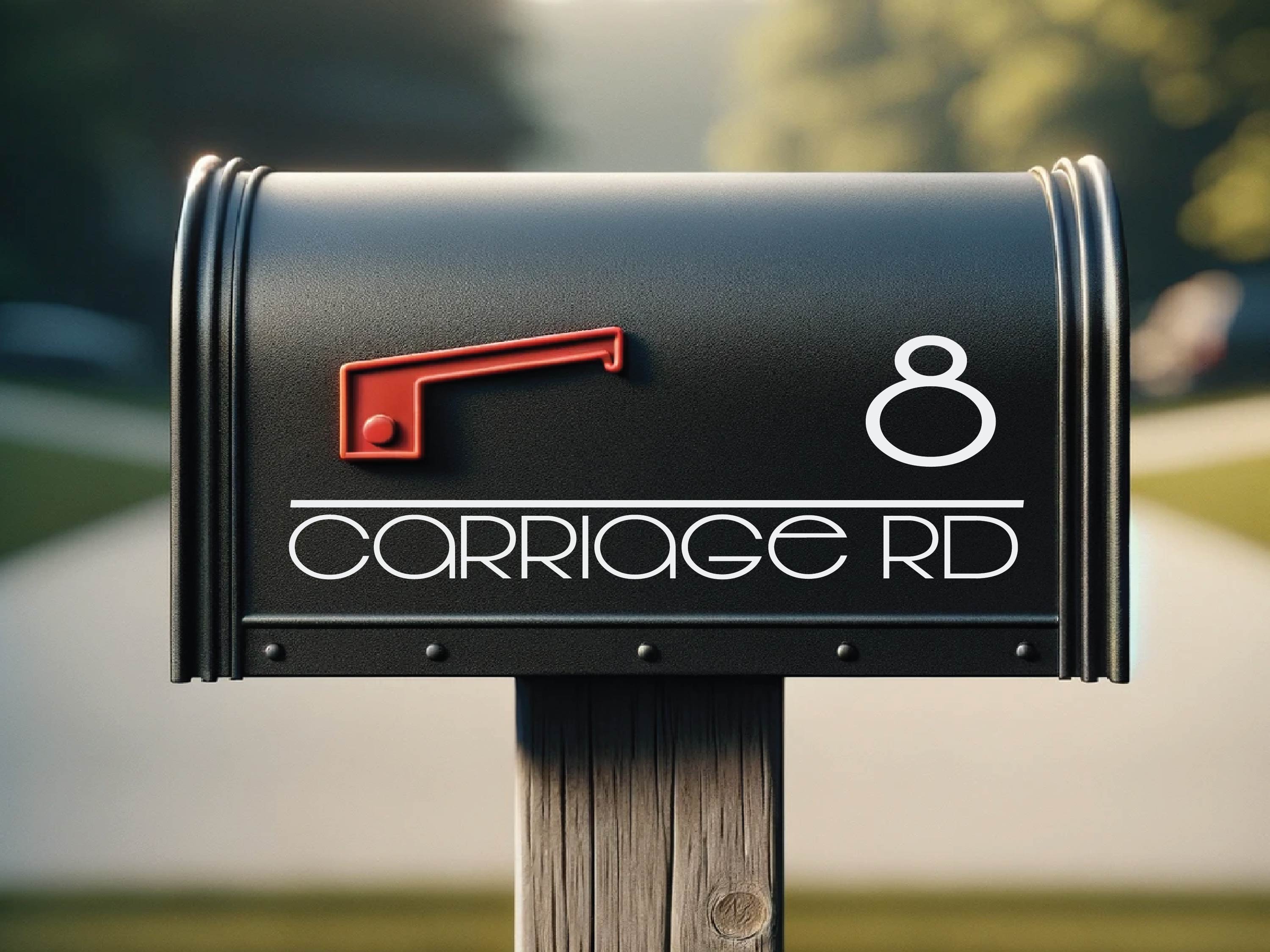 white vinyl house address and number decal on black mailbox