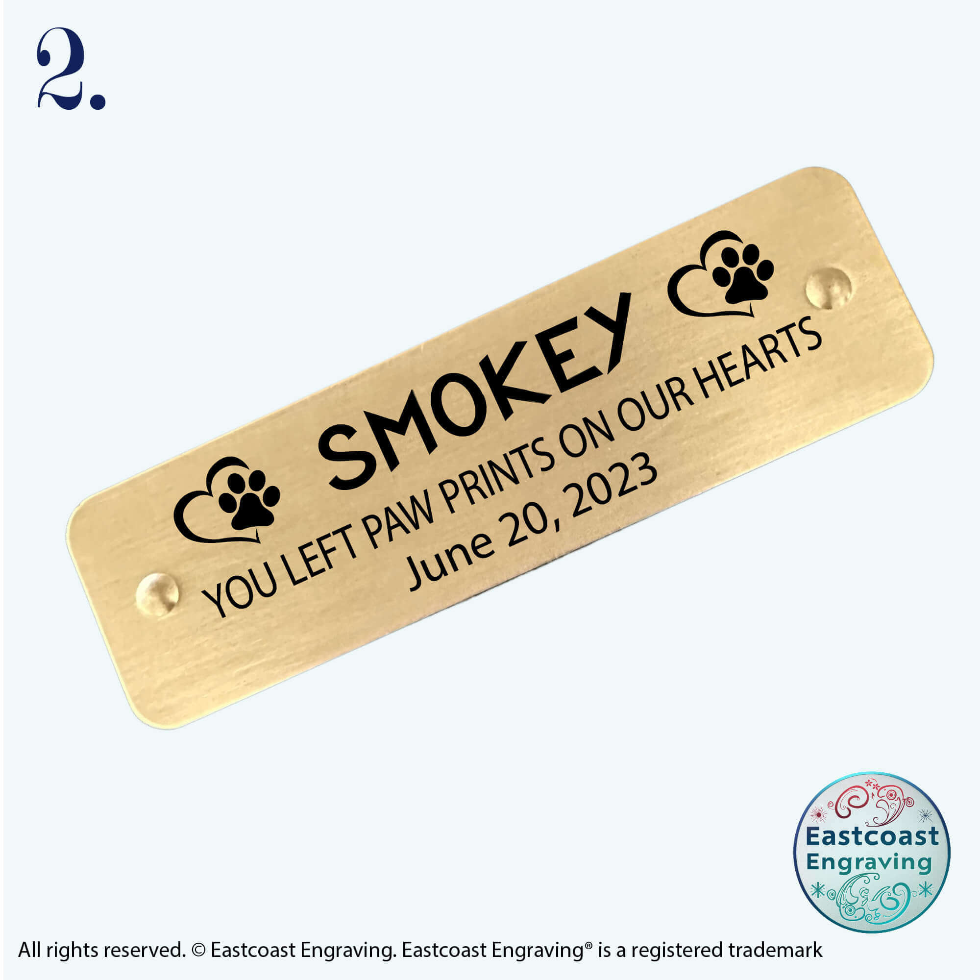 Brass pet memorial nameplate with custom engraving, suitable for remembrance displays.