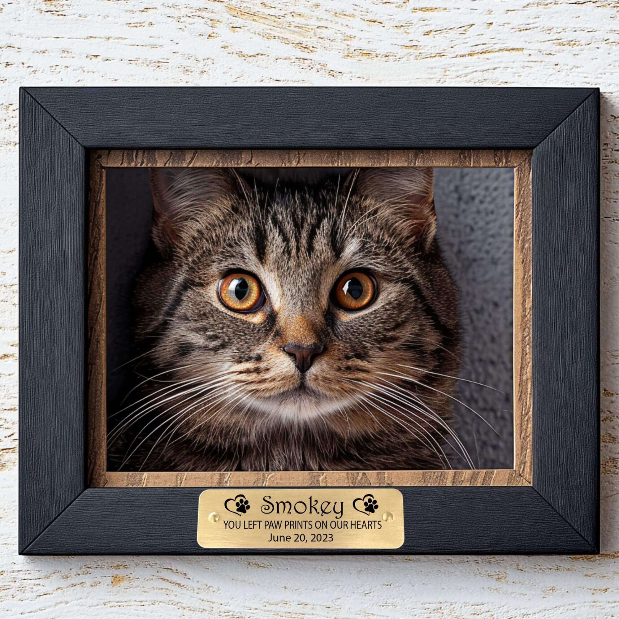 Engraved pet memorial tag in brass with adhesive backing, featuring custom name and date by Eastcoast Engraving.