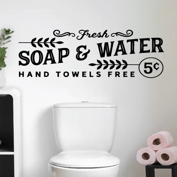 Fresh soap and water vinyl wall decal displayed above a modern bathroom sink