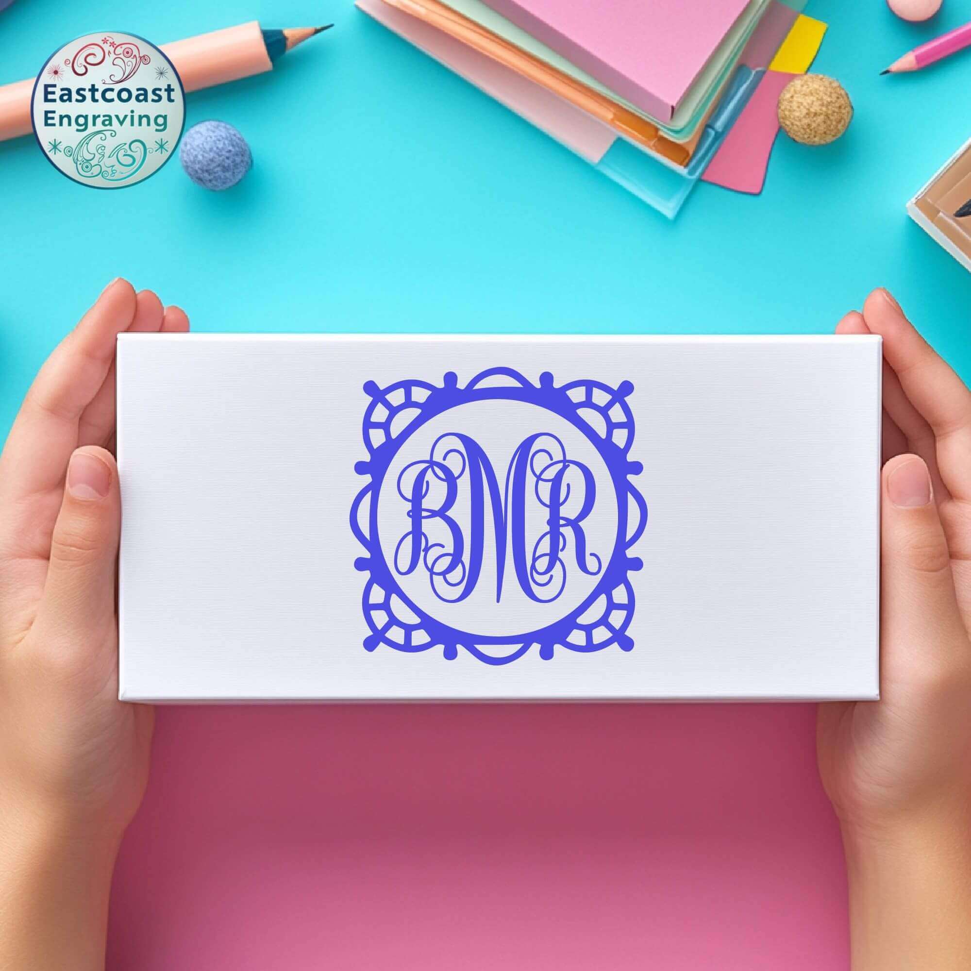Initials vinyl decal on a gift box – stylish custom name sticker