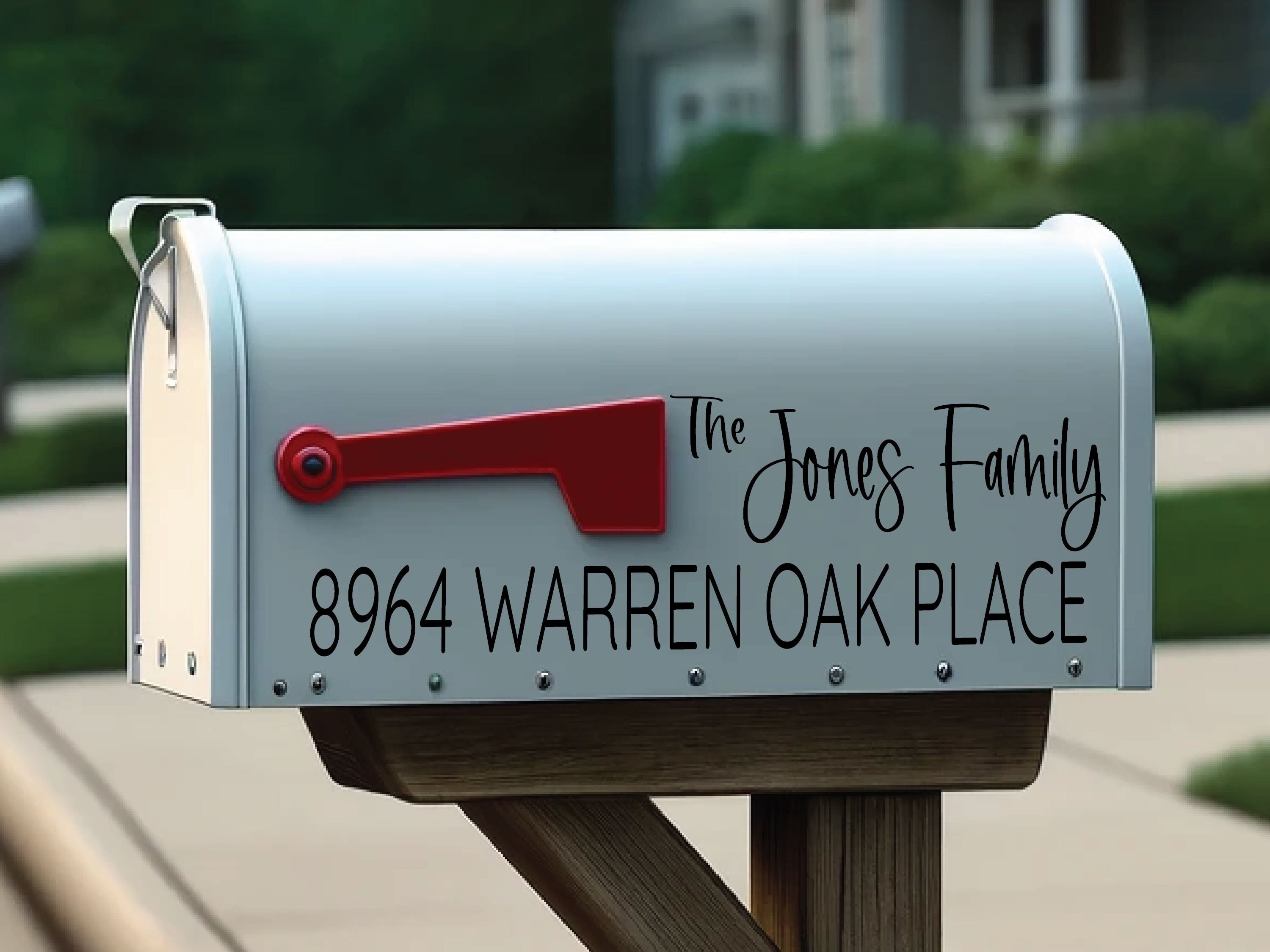personalized last name vinyl sticker applied to mailbox