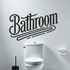Retro bathroom wall decal with vintage lettering installed above toilet