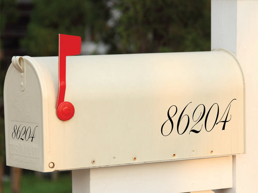 Sleek white mailbox with contrasting black script-style mailbox number decal, enhancing readability and aesthetic