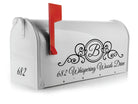 Scroll-style monogram mailbox decal on white mailbox with address and initial