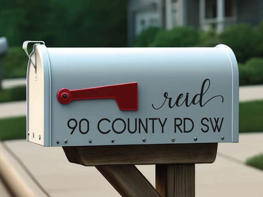 Mailbox updated with custom vinyl lettering and address sticker for unique home exterior