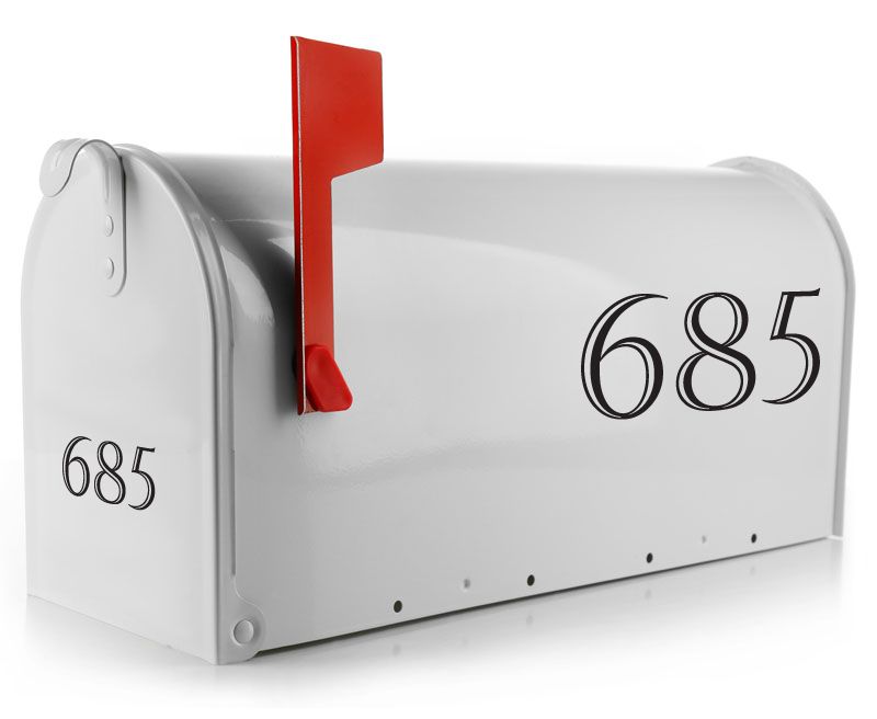 Crisp white mailbox adorned with a black custom mailbox number decal in a clear, legible font.